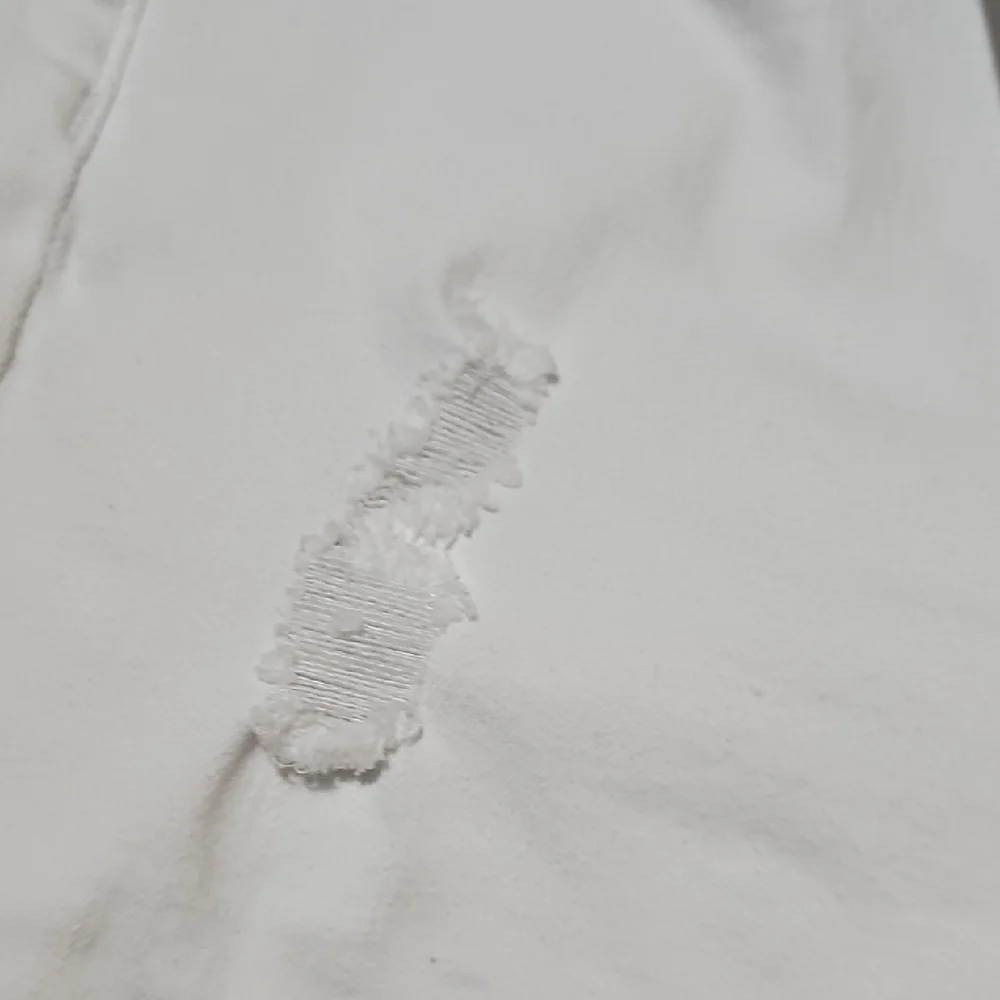 Express White Distressed Skinny Jeans